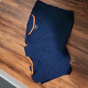 2 medium-sized, royal blue, scrub top, soft fabric, with 3 pockets. 2 for $24